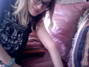 Image: Me, Beth, bending/hyperextending my left elbow backwards.