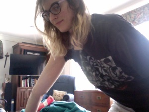 Image: Me, Beth, bending/hyperextending my right elbow backwards.